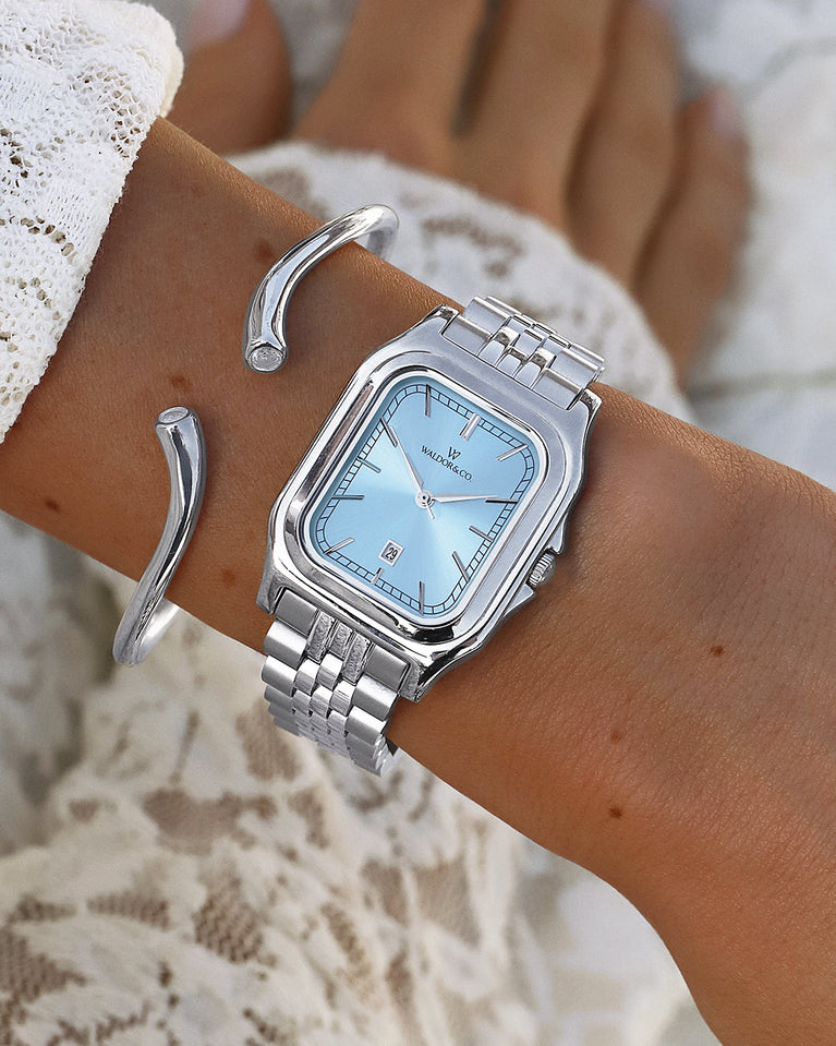  A square womens watch in 316L stainless steel from Waldor & Co. with blue Diamond Cut Sapphire Crystal glass dial. Seiko movement. The model is Delight 32 Chelsea