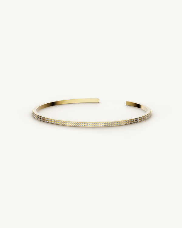 A Bangle in 14k gold plated 316L stainless steel from Waldor & Co. One size. The model is Pavé Bangle Polished.